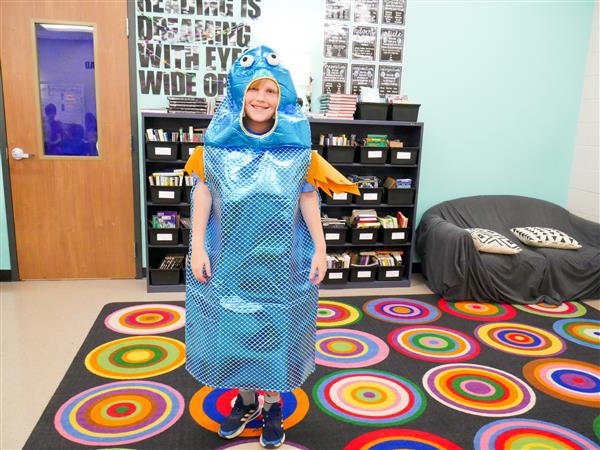 Fifth Graders putting on a Pun Fashion Show.